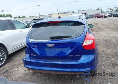 2012 Ford Focus Titanium z USA, uszkodzony, nr VIN 1FAHP3N24CL283473